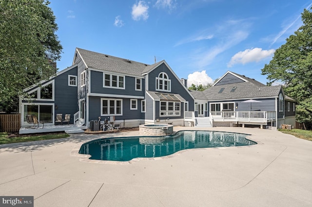 10309 E Hunter Valley Rd, Vienna, VA 22181 - view of pool featuring a wooden deck, a patio, and a pool with connected hot tub