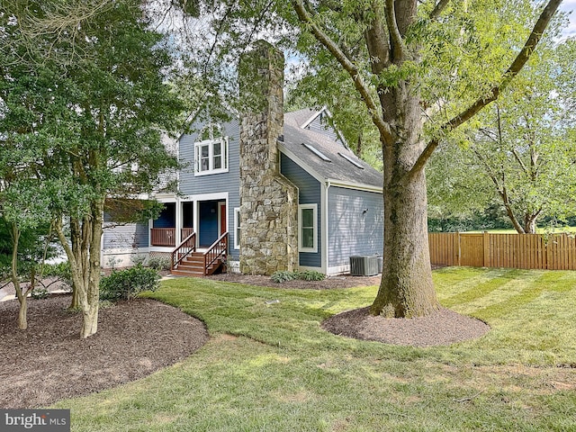10309 E Hunter Valley Rd, Vienna, VA 22181 - view of front facade with a chimney and covered porch