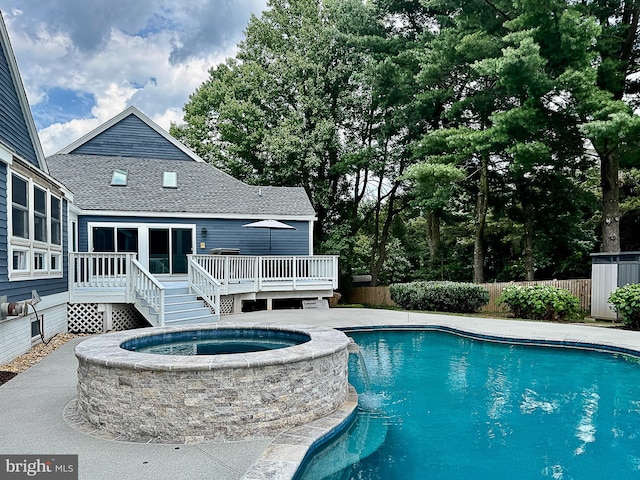 10309 E Hunter Valley Rd, Vienna, VA 22181 - view of swimming pool with a deck and a pool with connected hot tub