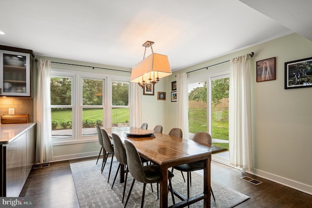 10309 E Hunter Valley Rd, Vienna, VA 22181 - dining area with a chandelier and dark wood-type flooring