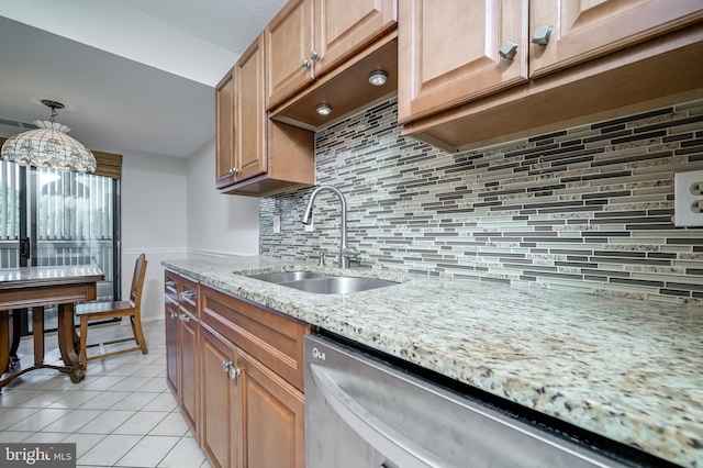 15100 Interlachen Dr Unit 4-207, Silver Spring, MD 20906 - kitchen with dishwasher, light stone counters, light tile patterned floors, and decorative backsplash