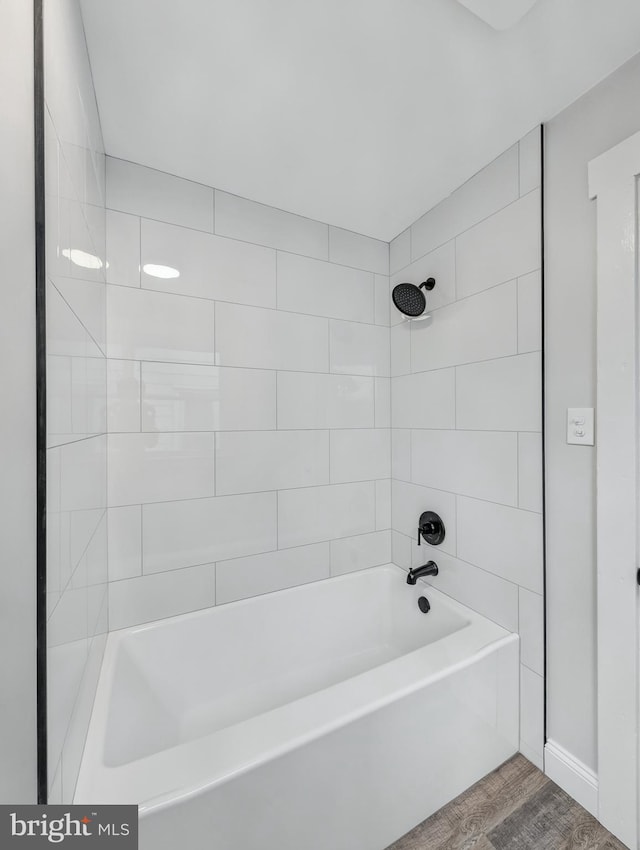 729 E Main St, Ephrata, PA 17522 - bathroom with wood finished floors and washtub / shower combination