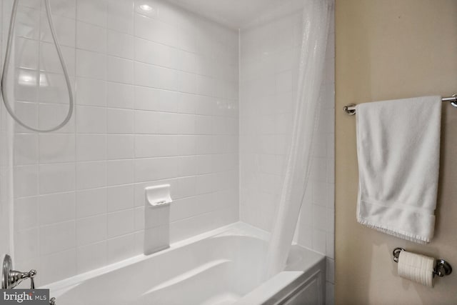 4195 S Four Mile Run Dr Unit 203, Arlington, VA 22204 - bathroom with shower / bath combo with shower curtain