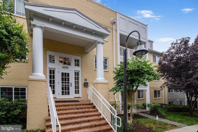 4195 S Four Mile Run Dr Unit 203, Arlington, VA 22204 - entrance to property featuring brick siding