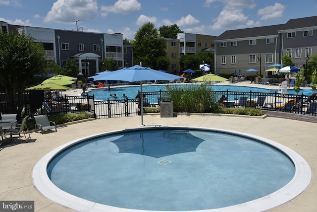 4195 S Four Mile Run Dr Unit 203, Arlington, VA 22204 - community pool featuring a patio area