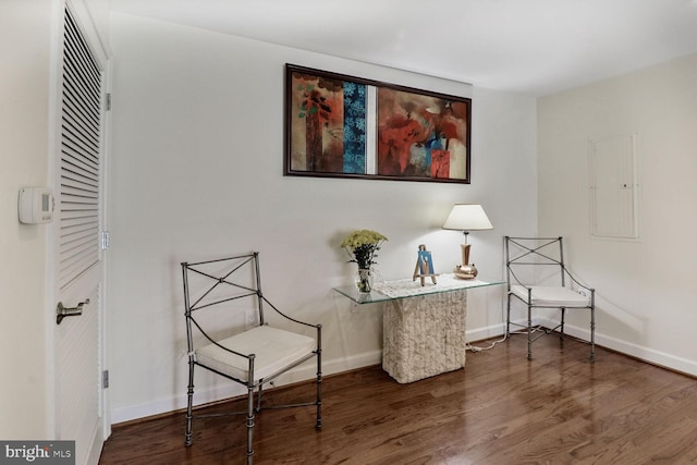 4195 S Four Mile Run Dr Unit 203, Arlington, VA 22204 - living area featuring wood finished floors and electric panel