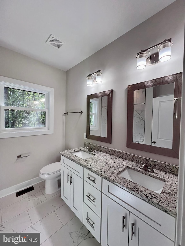 982 Mattox Ave, Colonial Beach, VA 22443 - full bath featuring double vanity and marble finish floors