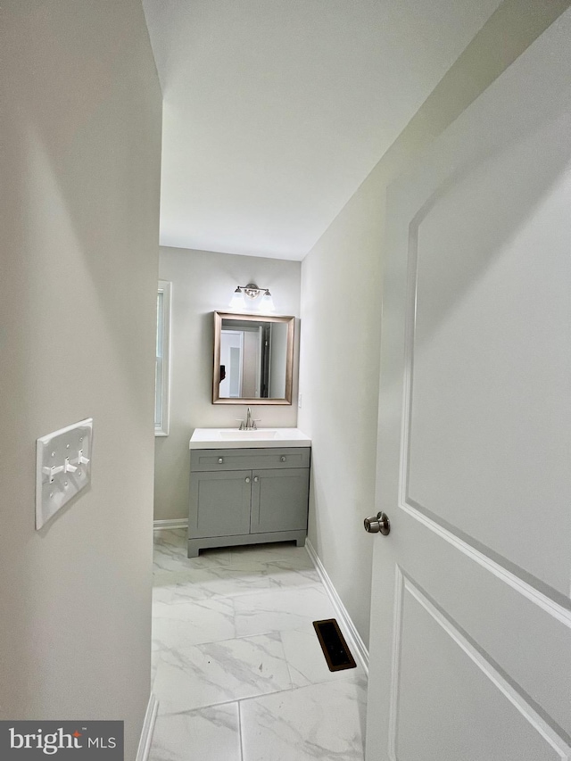 982 Mattox Ave, Colonial Beach, VA 22443 - bathroom with marble finish flooring and vanity