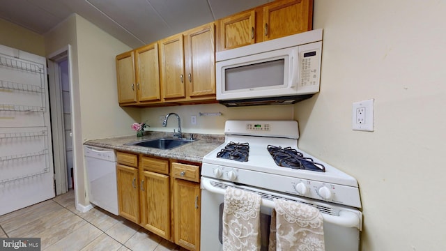 2605 Redcoat Dr Unit 252, Alexandria, VA 22303 - kitchen with white appliances, light tile patterned floors, and light countertops