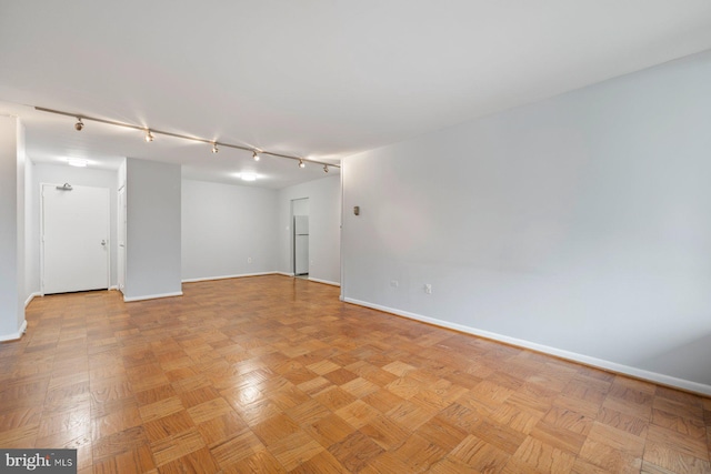 2939 Van Ness St NW Unit 230, Washington, DC 20008 - spare room with rail lighting and baseboards