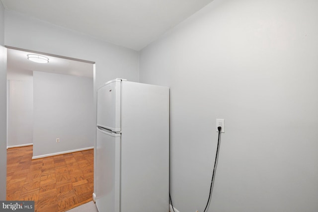 2939 Van Ness St NW Unit 230, Washington, DC 20008 - kitchen featuring freestanding refrigerator and baseboards