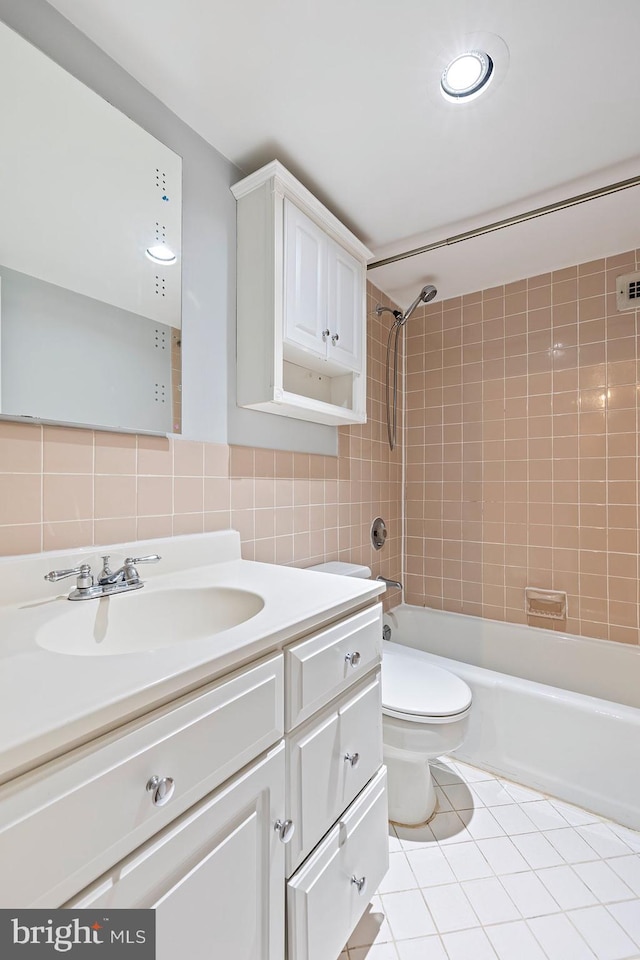 2939 Van Ness St NW Unit 230, Washington, DC 20008 - full bath with vanity, tile patterned floors, shower / bathtub combination, tile walls, and backsplash