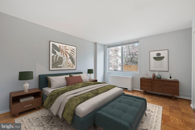 2939 Van Ness St NW Unit 230, Washington, DC 20008 - bedroom with radiator and baseboards