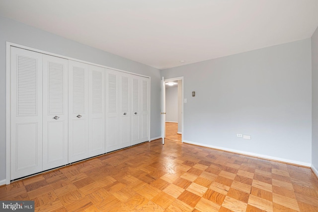 2939 Van Ness St NW Unit 230, Washington, DC 20008 - unfurnished bedroom featuring baseboards and a closet