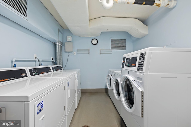 2939 Van Ness St NW Unit 230, Washington, DC 20008 - community laundry room featuring washing machine and dryer and baseboards