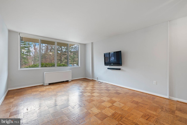 2939 Van Ness St NW Unit 230, Washington, DC 20008 - spare room with radiator and baseboards
