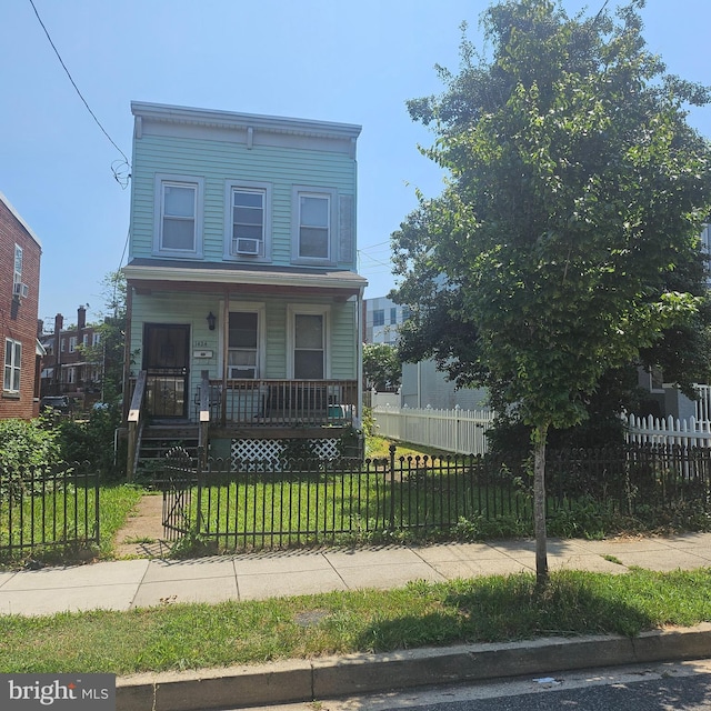 1424 22nd St SE, Washington, DC 20020 - view of front facade with a porch and a fenced front yard