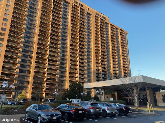 3705 S George Mason Dr Unit 1316S, Falls Church, VA 22041 - view of building exterior with uncovered parking
