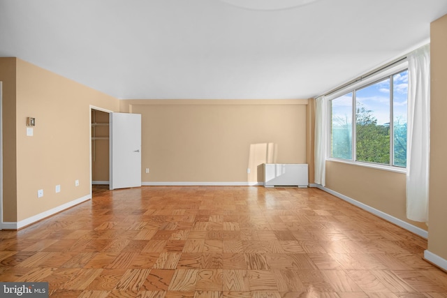 6641 Wakefield Dr Unit 405, Alexandria, VA 22307 - empty room featuring baseboards and radiator heating unit