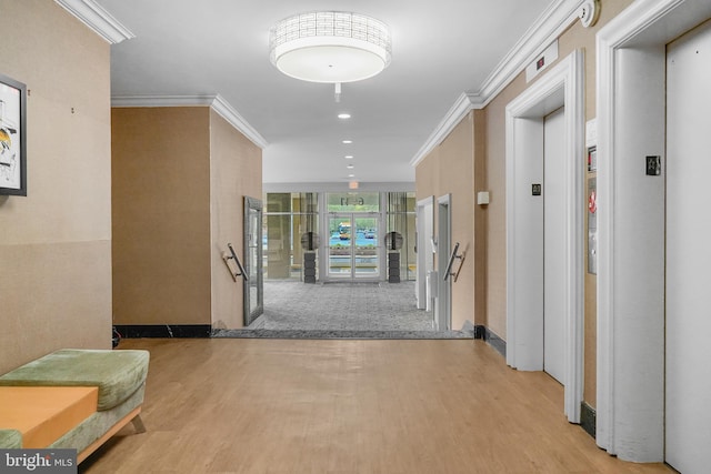 6641 Wakefield Dr Unit 405, Alexandria, VA 22307 - corridor featuring elevator, wood finished floors, crown molding, and recessed lighting