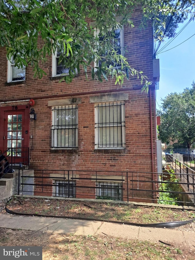 76 Galveston Pl SW Unit E, Washington, DC 20032 - view of side of property with brick siding