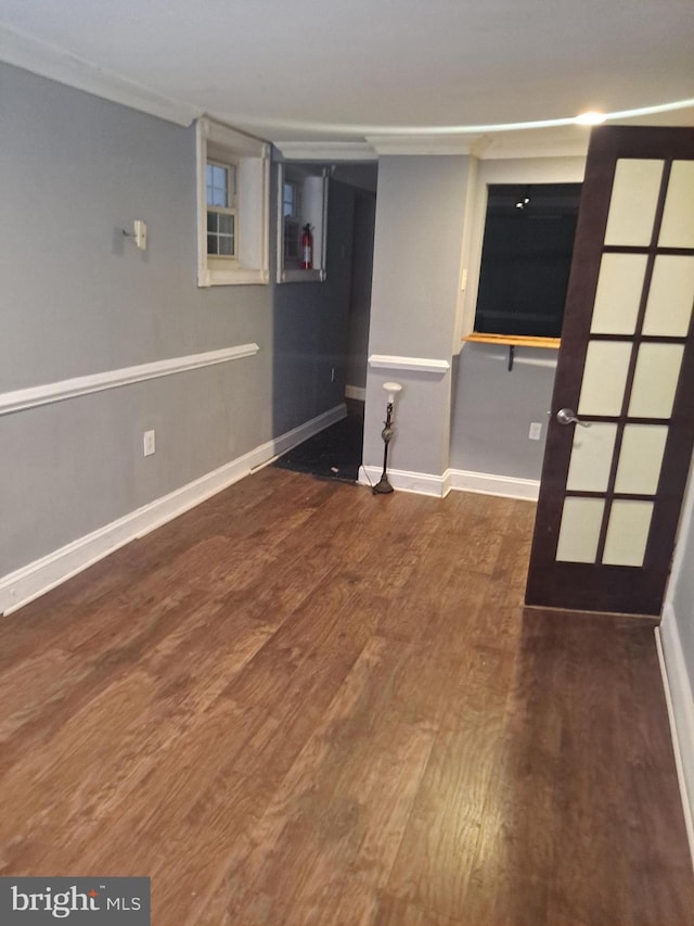 76 Galveston Pl SW Unit E, Washington, DC 20032 - basement featuring wood finished floors and baseboards
