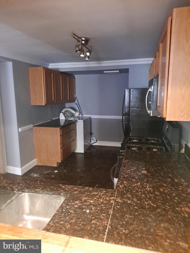 76 Galveston Pl SW Unit E, Washington, DC 20032 - kitchen with stainless steel microwave and dark countertops