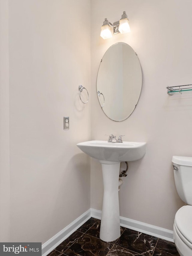 8730 Thornbrook Dr, Odenton, MD 21113 - bathroom featuring marble finish flooring and baseboards