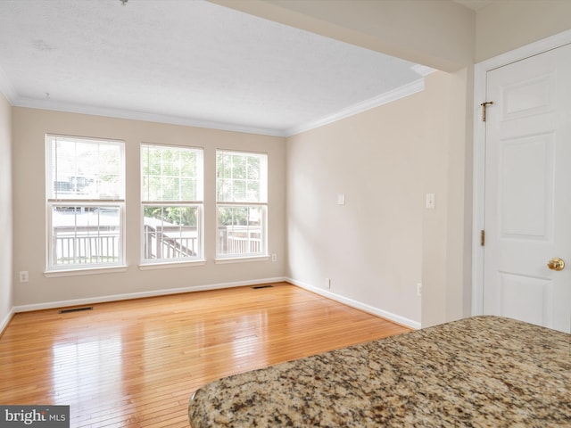 8730 Thornbrook Dr, Odenton, MD 21113 - unfurnished bedroom with wood-type flooring and crown molding