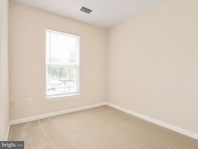 8730 Thornbrook Dr, Odenton, MD 21113 - empty room with carpet flooring and healthy amount of natural light