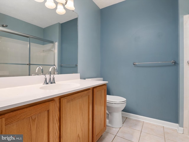 8730 Thornbrook Dr, Odenton, MD 21113 - bathroom with tile patterned flooring, vanity, a shower with shower door, and a chandelier