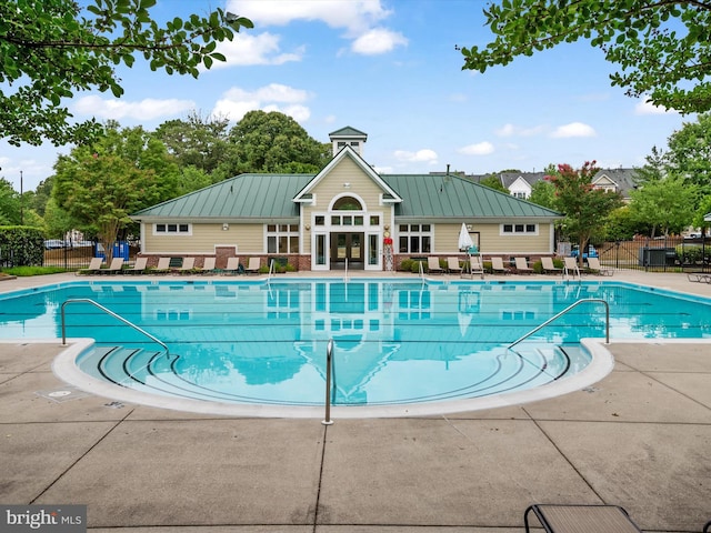 8730 Thornbrook Dr, Odenton, MD 21113 - community pool featuring french doors and a patio