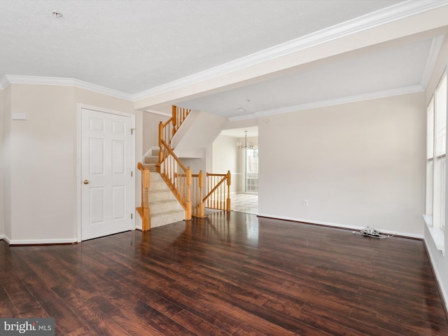 8730 Thornbrook Dr, Odenton, MD 21113 - empty room featuring wood finished floors, a chandelier, stairway, and crown molding