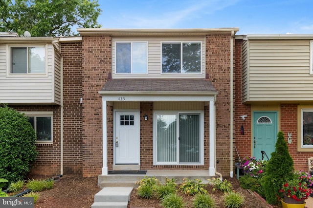 415 Argus Pl, Sterling, VA 20164 - view of property with brick siding
