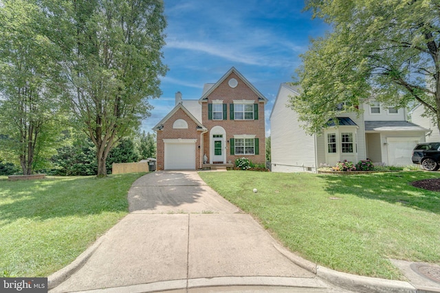 8 Ashley Ct, Stafford, VA 22554 - traditional-style house with brick siding, concrete driveway, a front lawn, and an attached garage