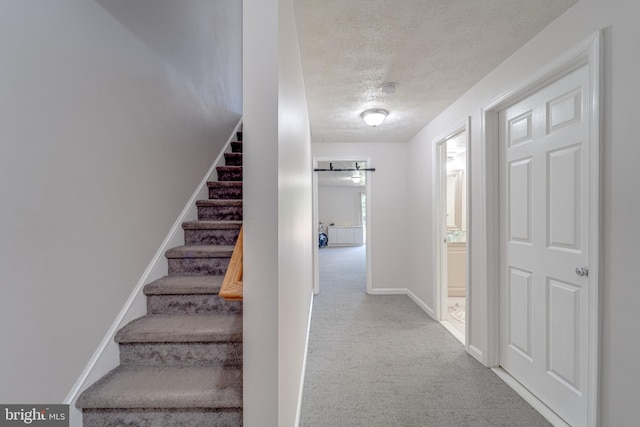 8 Ashley Ct, Stafford, VA 22554 - stairs with a textured ceiling and carpet floors