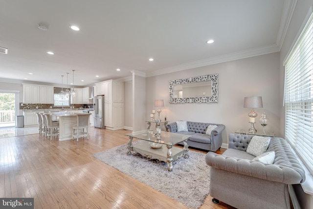 8 Ashley Ct, Stafford, VA 22554 - living area featuring light wood-style flooring, crown molding, and recessed lighting