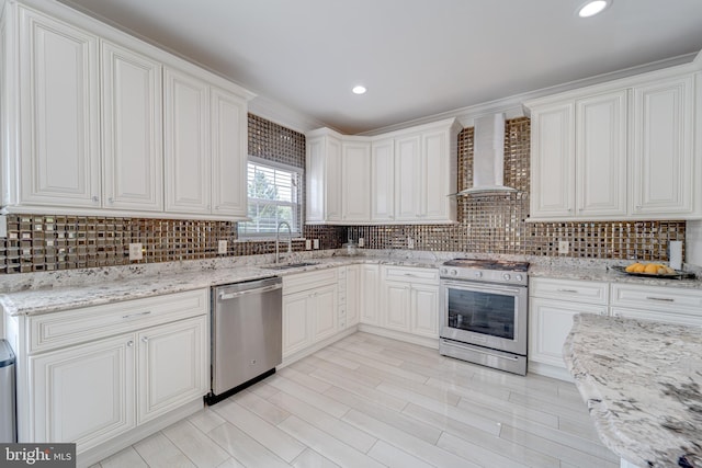 8 Ashley Ct, Stafford, VA 22554 - kitchen featuring stainless steel appliances, wall chimney exhaust hood, backsplash, white cabinetry, and recessed lighting