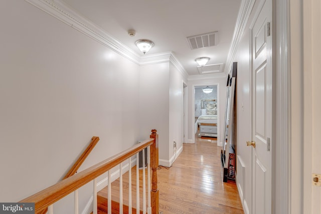8 Ashley Ct, Stafford, VA 22554 - hallway with crown molding, light wood-style flooring, an upstairs landing, and attic access
