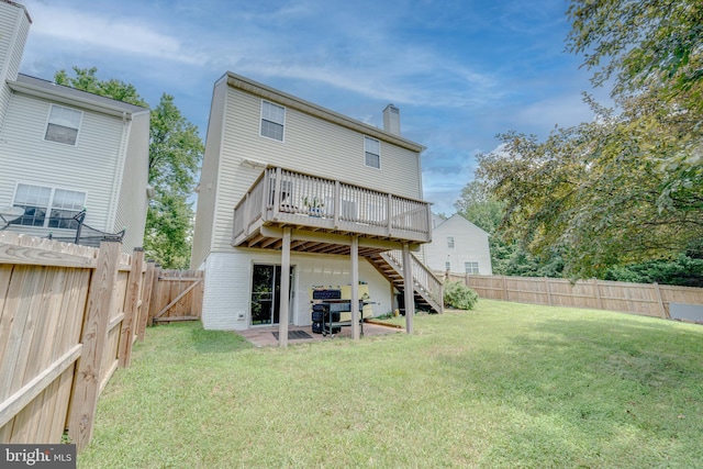 8 Ashley Ct, Stafford, VA 22554 - rear view of house featuring stairway, a chimney, a wooden deck, a fenced backyard, and a gate