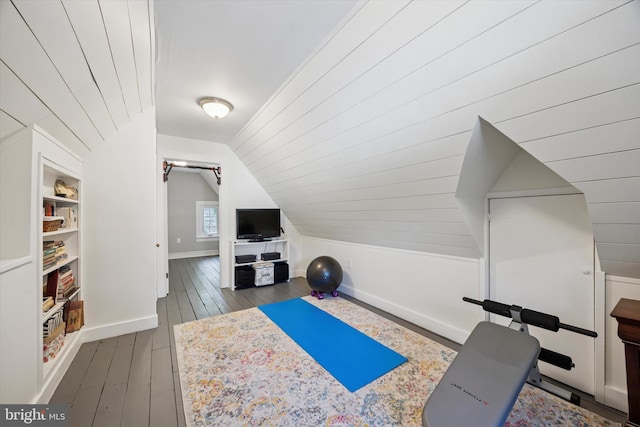 927 Drexel Ave, Drexel Hill, PA 19026 - workout area featuring wood-type flooring, vaulted ceiling, and built in features