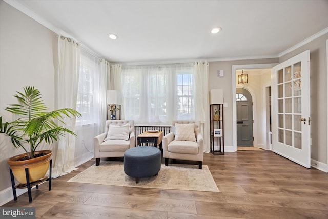 927 Drexel Ave, Drexel Hill, PA 19026 - living area featuring ornamental molding, wood finished floors, and recessed lighting