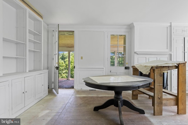 453 Bayard Rd, Kennett Square, PA 19348 - dining space featuring light wood-style flooring and a decorative wall