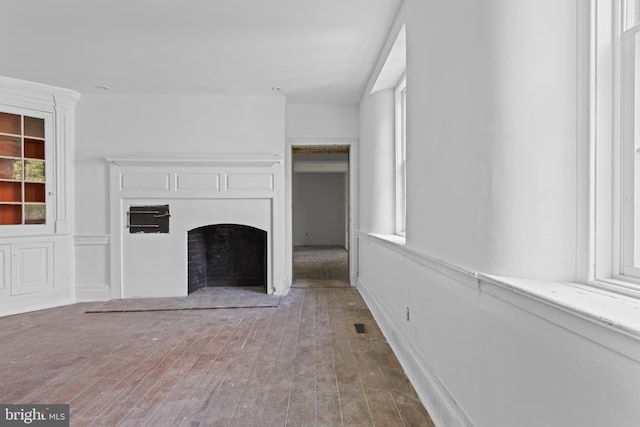 453 Bayard Rd, Kennett Square, PA 19348 - unfurnished living room featuring a fireplace and wood finished floors