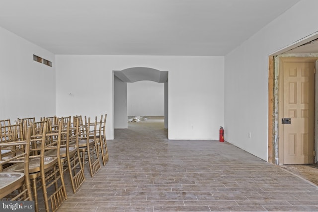 453 Bayard Rd, Kennett Square, PA 19348 - spare room featuring arched walkways and wood finished floors