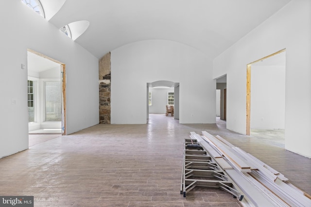 453 Bayard Rd, Kennett Square, PA 19348 - hall with wood finished floors, arched walkways, and high vaulted ceiling