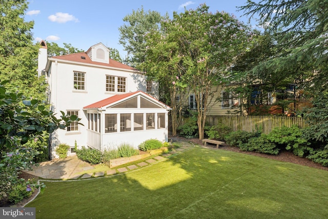 3518 35th St NW, Washington, DC 20016 - rear view of house with a sunroom and stucco siding