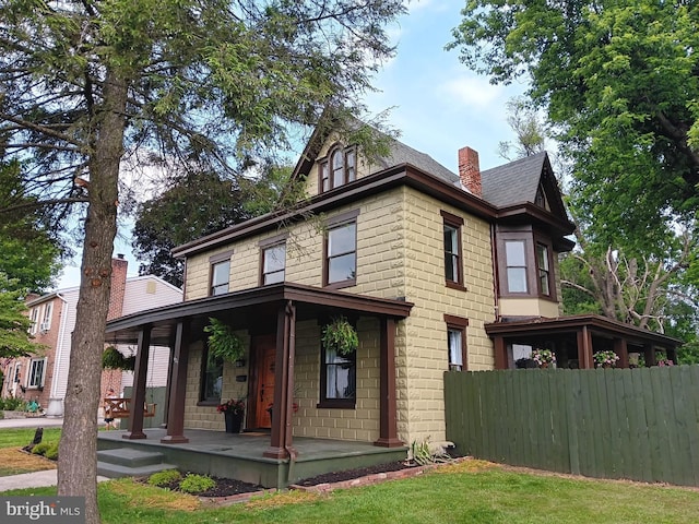 421 C St, Carlisle, PA 17013 - view of front facade featuring a chimney and a porch