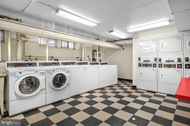 1954 Columbia Rd NW Unit 112, Washington, DC 20009 - shared laundry featuring separate washer and dryer, tile patterned floors, and stacked washer / drying machine