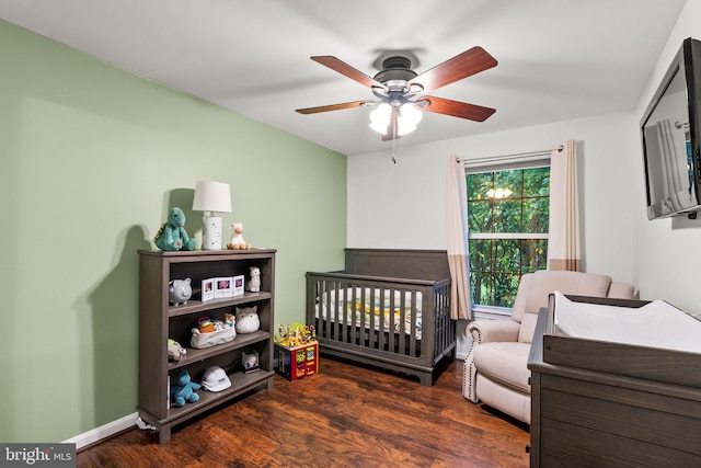 9304 Taverney Ter, Gaithersburg, MD 20879 - bedroom featuring wood finished floors, a nursery area, and a ceiling fan